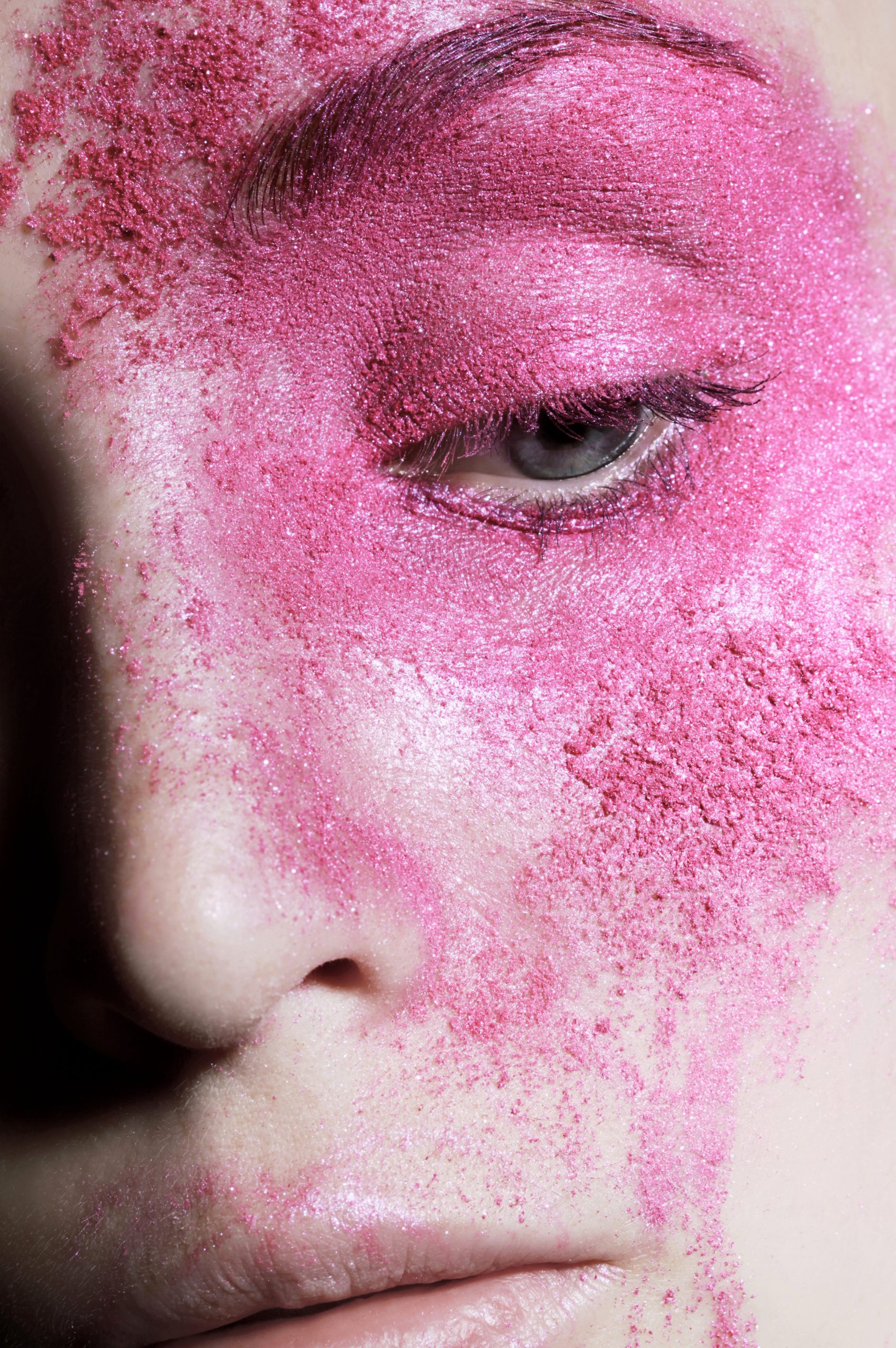 part-of-face-covered-with-pink-powder