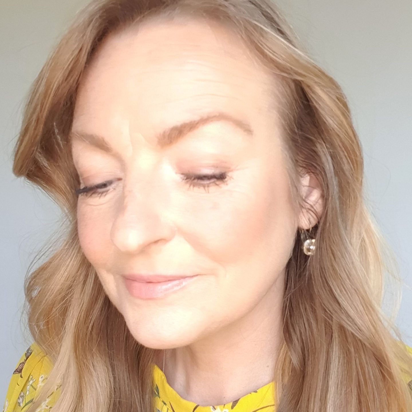 Older female model with natural wedding makeup look side view Older female model with natural wedding makeup look side view