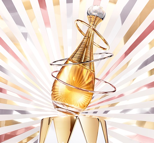 Dior_Xmas_MRD_Matrix_Banner_Large_514x476px_01_Jadore.png Dior J'Adore-Parfümflakon mit goldenem Farbton und drei metallischen Spiralringen, vor einem strahlenden Hintergrund aus goldenen, silbernen und bronzenen Linien.