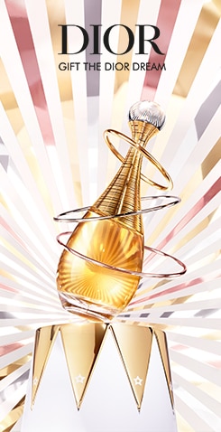 Dior J&apos;Adore-Parfümflakon mit goldenem Farbton und drei metallischen Spiralringen, vor einem strahlenden Hintergrund aus goldenen, silbernen und bronzenen Linien.